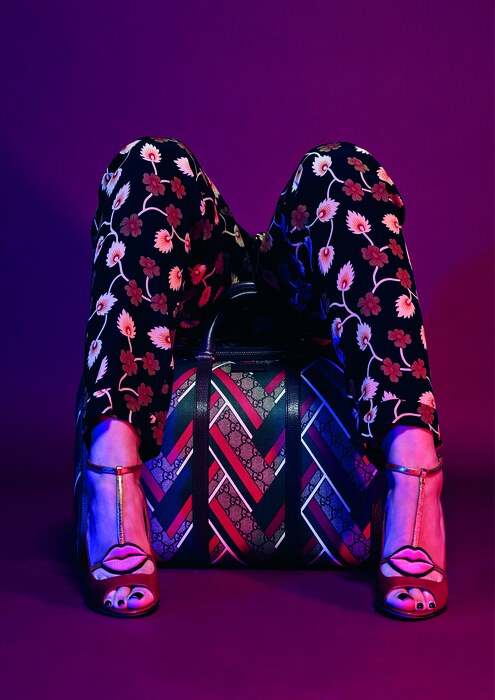 Gucci-inspired accessories editorial featuring sculptural heels and a signature bag